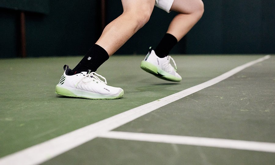 Player cutting hard sideways with the ankle braced by a supportive shoe