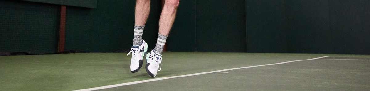 Airborne serve legs in Mizuno Wave Enforce Tour shoes