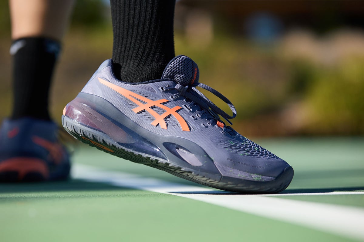 Extreme close-up of an ASICS Gel-Resolution shoe driving off the toe on court
